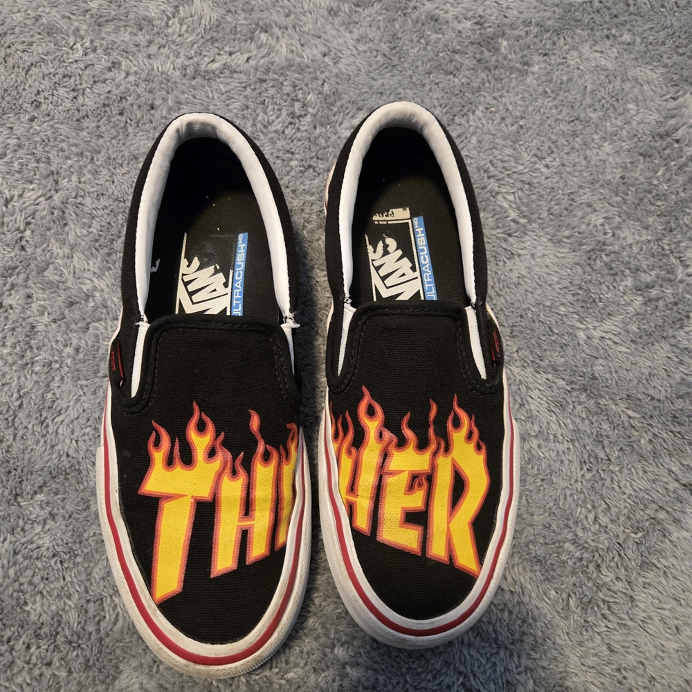 Vans Kids Black Slip-On Sneakers with Flame Graphics